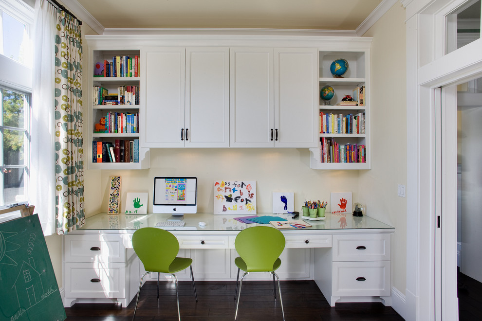 West Coast Hamptons - The large family room features a cozy fireplace, TV media, and a large built-in bookcase. The adjoining craft room is separated by a set of pocket french doors; where the kids can be visible from the family room as they do their homework.