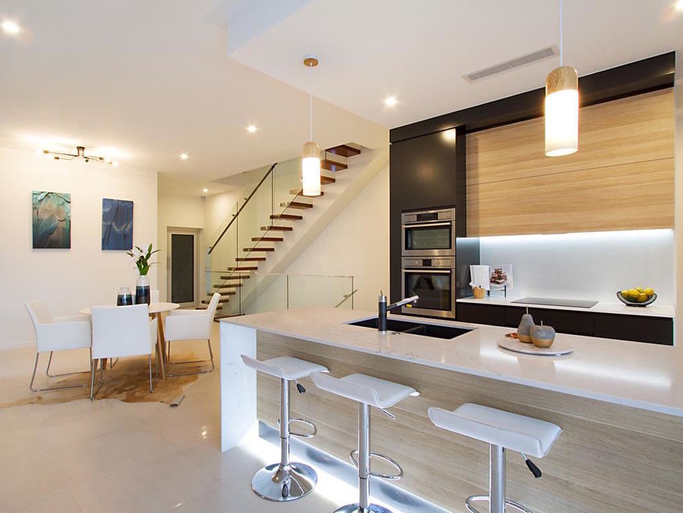 Design ideas for a large contemporary galley open plan kitchen in Gold Coast - Tweed with with island.