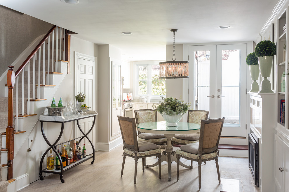 Example of a mid-sized classic light wood floor great room design in Boston with a standard fireplace