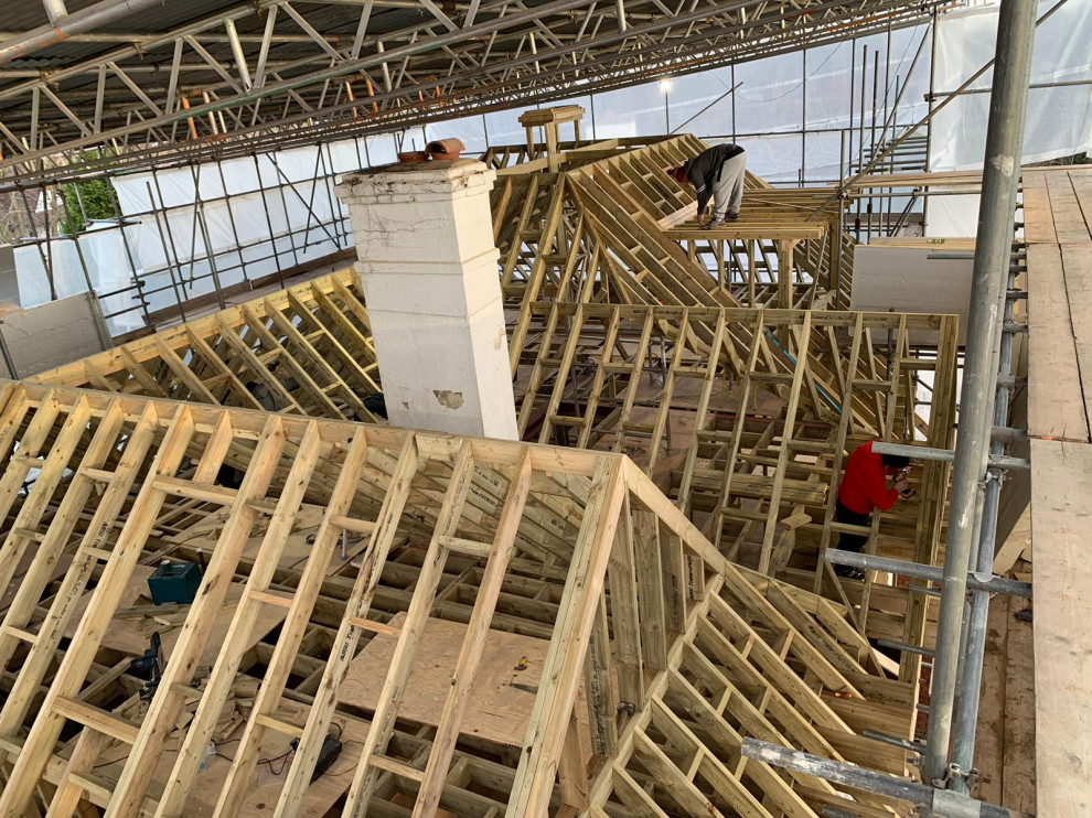 Double storey side and single rear extensions, full roof reconfiguration