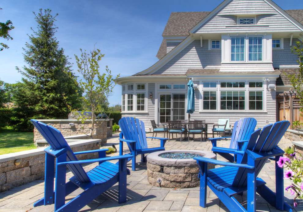 Inspiration for a beach style patio in Providence with a fire feature and no cover.