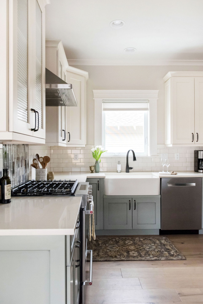 Example of a transitional kitchen design in Denver