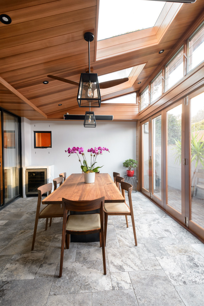This is an example of a contemporary sunroom in Sydney.