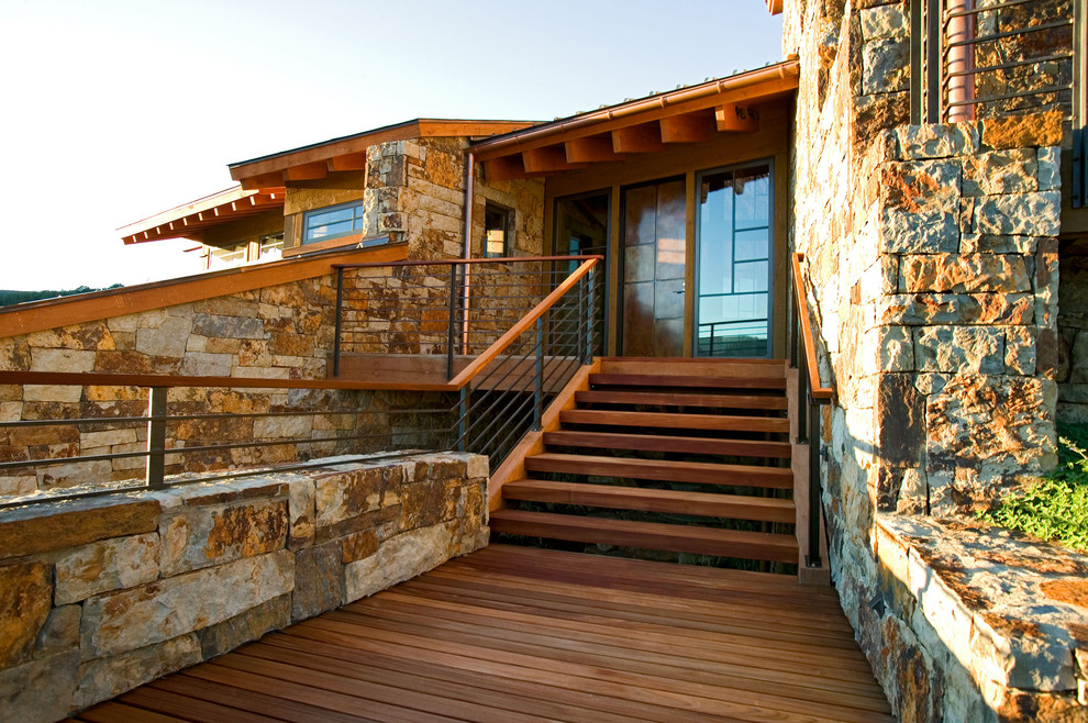 Photo of a contemporary exterior in Denver with stone veneer.