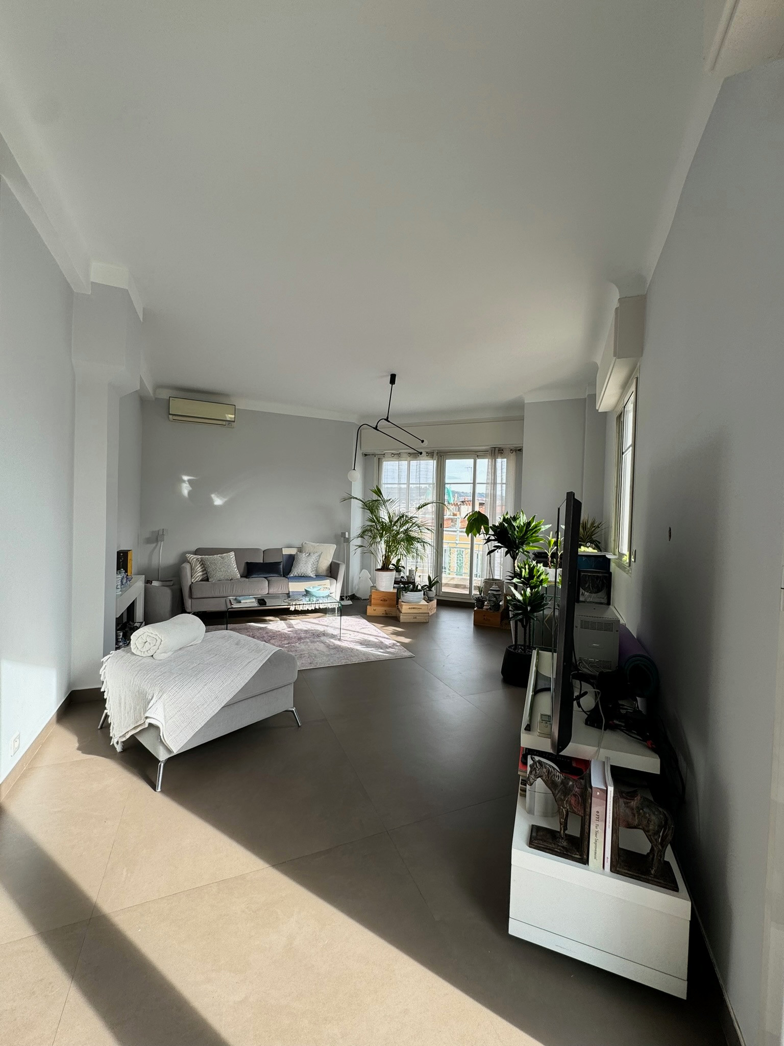 L’union parfaite : deux appartements transformés en un duplex unique