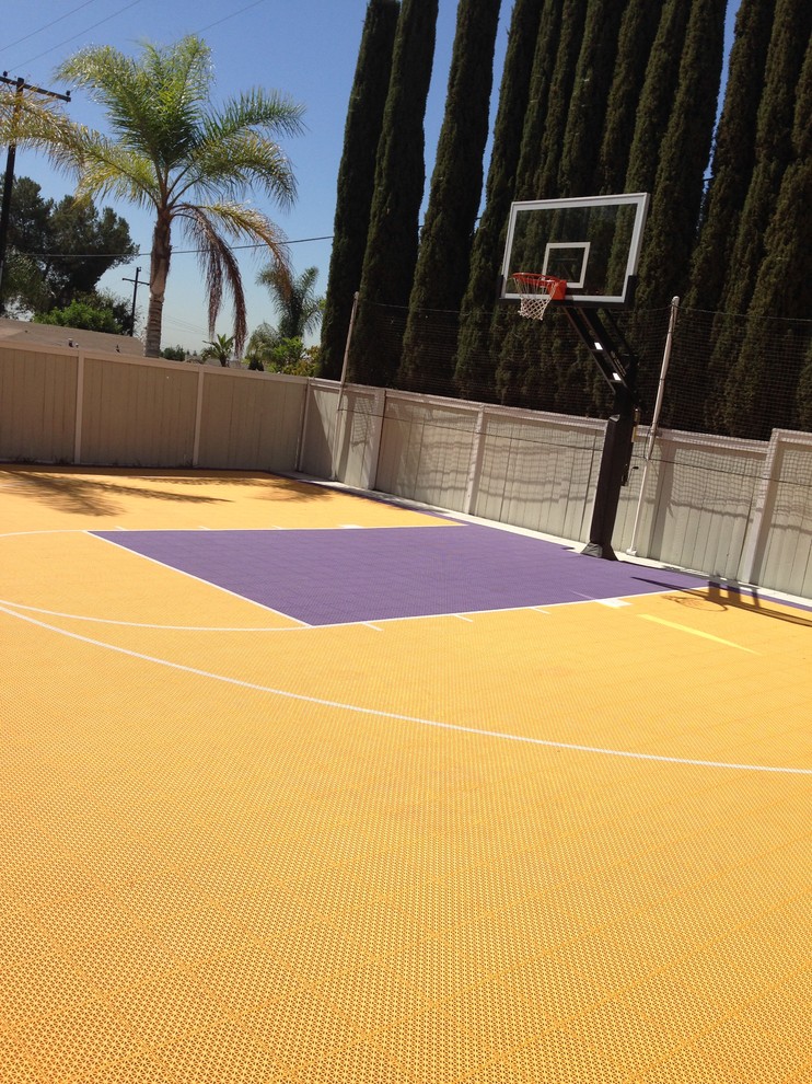 Design ideas for a large traditional backyard partial sun outdoor sport court in Los Angeles.