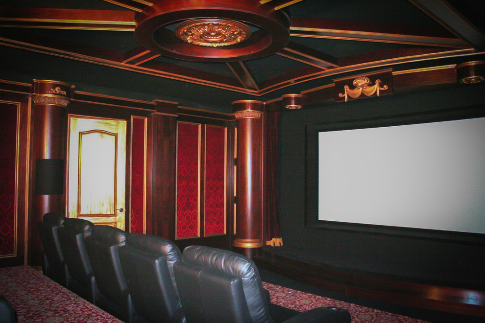 Large mediterranean enclosed home theatre in Austin with red walls, carpet, a built-in media wall and red floor.