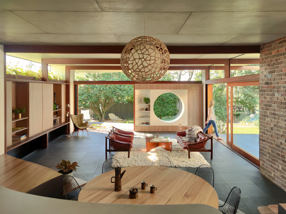 Design ideas for a midcentury living room in Sydney.