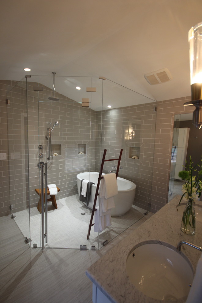 Huge minimalist master gray tile and ceramic tile porcelain tile bathroom photo in Raleigh with an undermount sink, shaker cabinets, white cabinets, marble countertops and gray walls