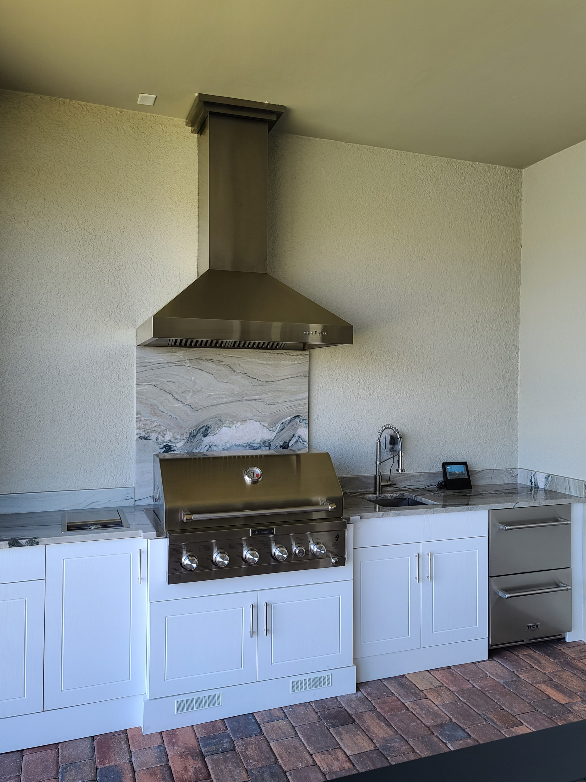 Outdoor Kitchens featuring a ZLINE Stainless Steel and Copper Outdoor Range Hood