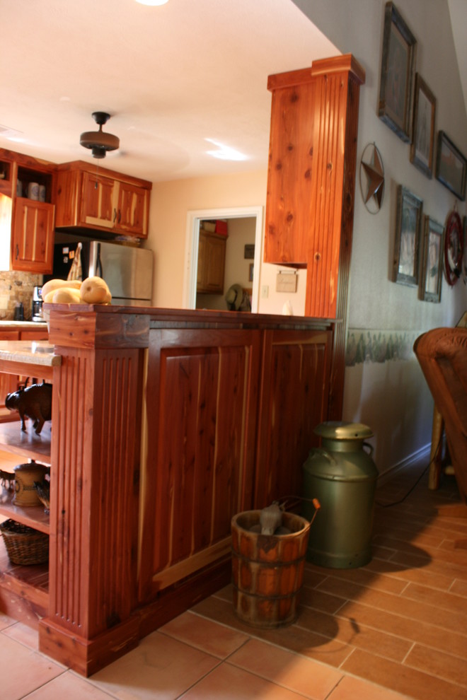Example of a mountain style kitchen design in Austin