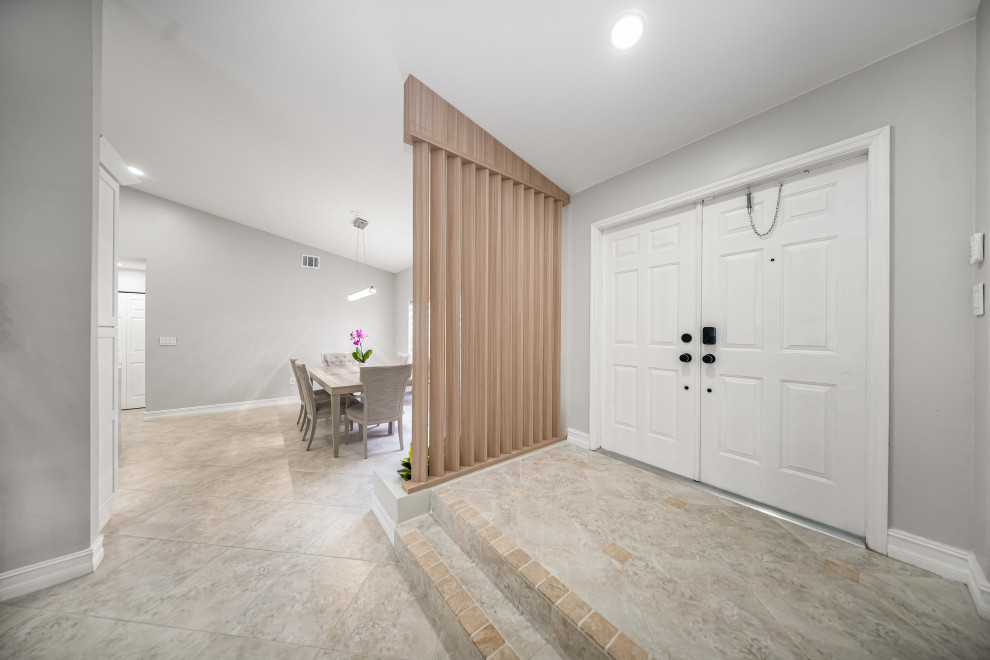 Entryway - transitional entryway idea in Miami
