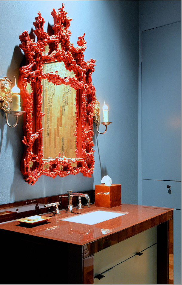 This is an example of a small bohemian ensuite bathroom in Houston with glass-front cabinets, red cabinets, a built-in shower, a wall mounted toilet, blue tiles, blue walls, ceramic flooring, a submerged sink, glass worktops, brown floors, an open shower, red worktops, a single sink and a floating vanity unit.