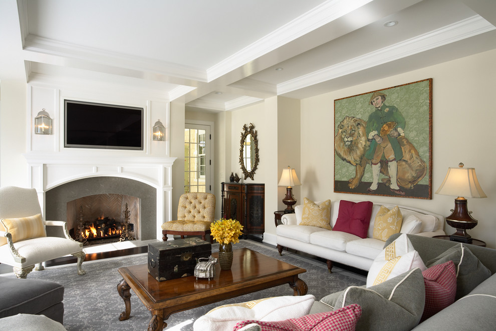 Mid-sized traditional enclosed family room in Minneapolis with beige walls, a standard fireplace, a wall-mounted tv and a stone fireplace surround.