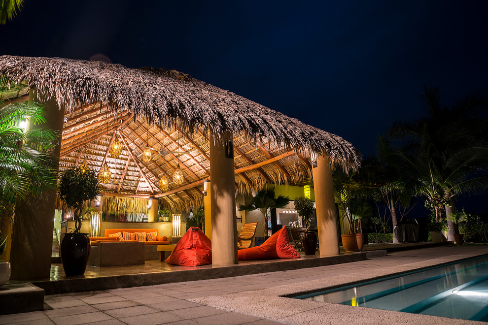 This is an example of a tropical patio in Other.