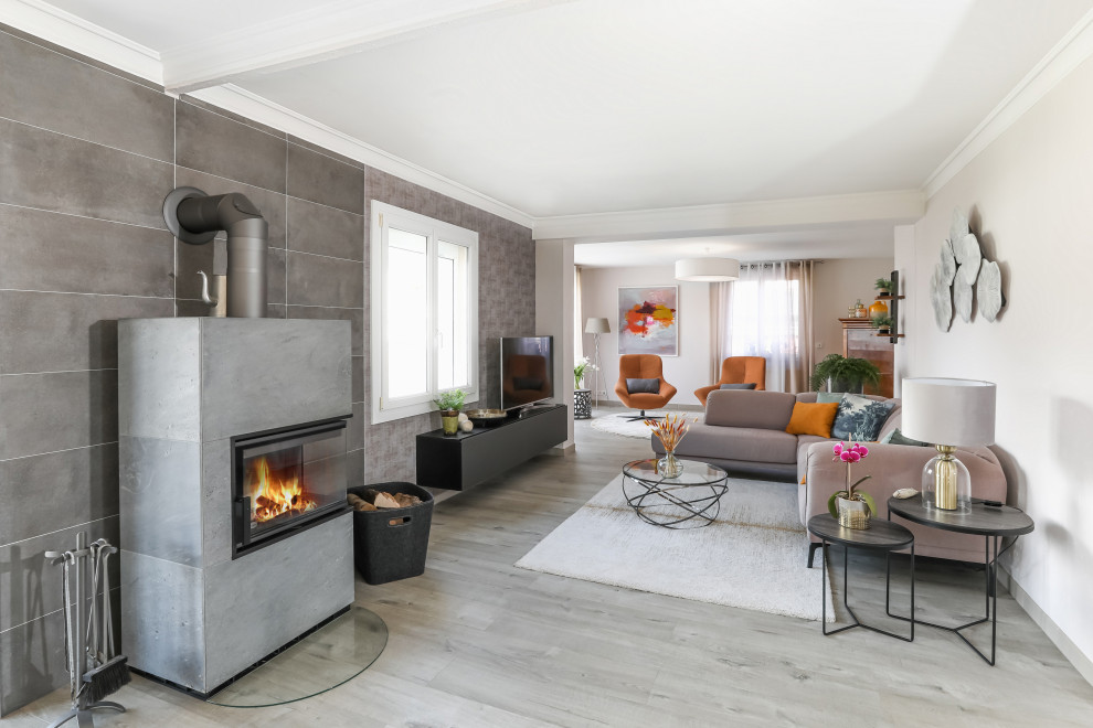 Inspiration for a huge contemporary open concept gray floor living room library remodel in Other with gray walls, a two-sided fireplace and a concrete fireplace
