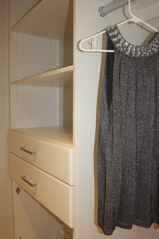 Inspiration for a small contemporary storage and wardrobe in Vancouver.