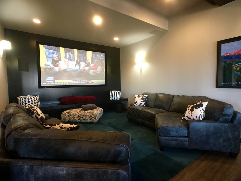 Photo of a large contemporary open concept home theatre in Milwaukee with white walls, vinyl floors and grey floor.