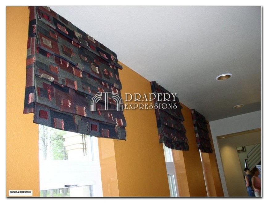 Example of a transitional home design design in Denver