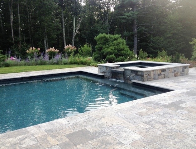 Design ideas for a large country backyard rectangular lap pool in Boston with a hot tub and tile.