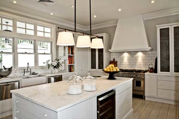 Inspiration for a large contemporary l-shaped open plan kitchen in Sydney with with island.
