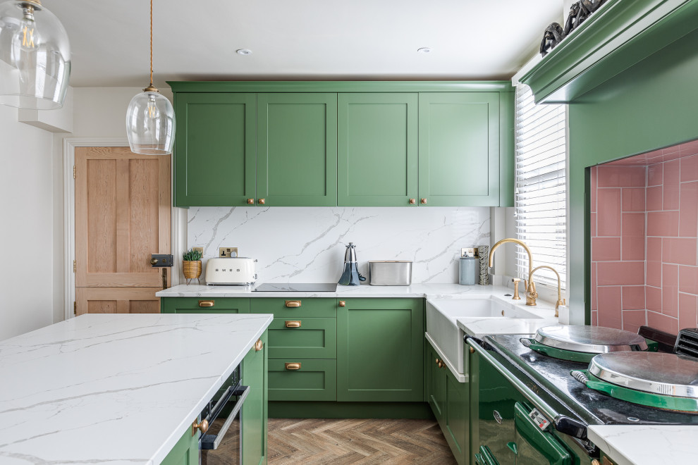 Design ideas for a large traditional u-shaped eat-in kitchen in Hertfordshire with shaker cabinets, green cabinets, quartzite benchtops and with island.
