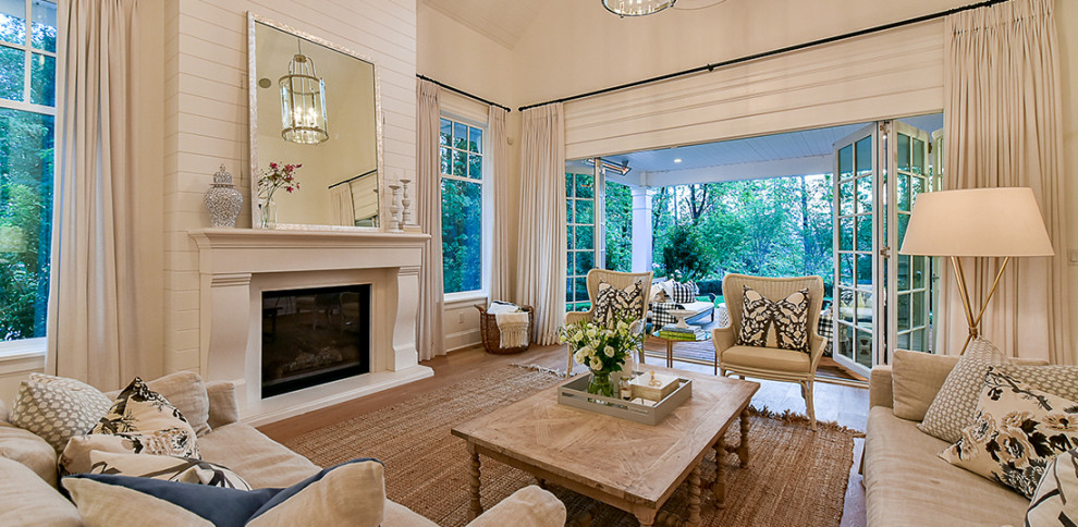 This is an example of an expansive classic living room in Houston.