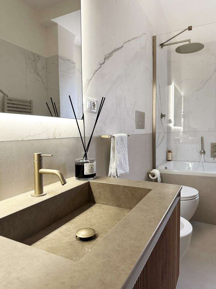 Design ideas for a large modern master bathroom in Rome with recessed-panel cabinets, brown cabinets, a drop-in tub, a shower/bathtub combo, a two-piece toilet, white tile, porcelain tile, white walls, porcelain floors, an integrated sink, granite benchtops, grey floor, a hinged shower door, grey benchtops, a single vanity and a floating vanity.