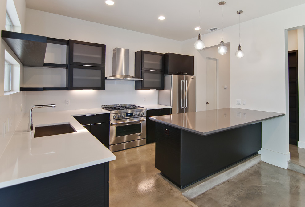 Contemporary kitchen in Austin with stainless steel appliances.