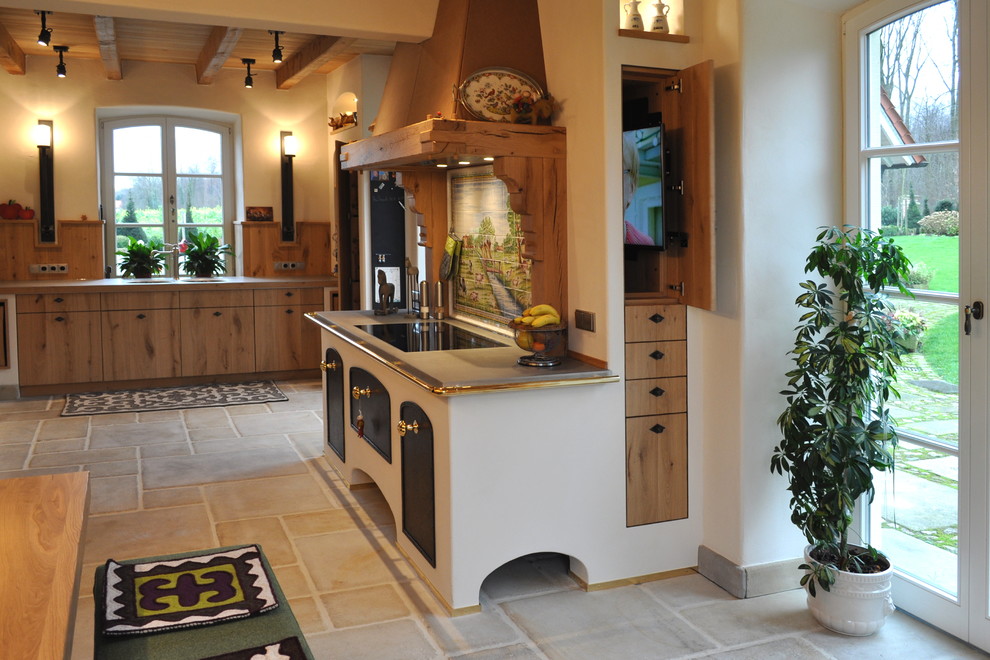 Photo of an expansive country eat-in kitchen in Dusseldorf with flat-panel cabinets, medium wood cabinets, a double-bowl sink, stainless steel benchtops, multi-coloured splashback, ceramic splashback, no island and limestone floors.