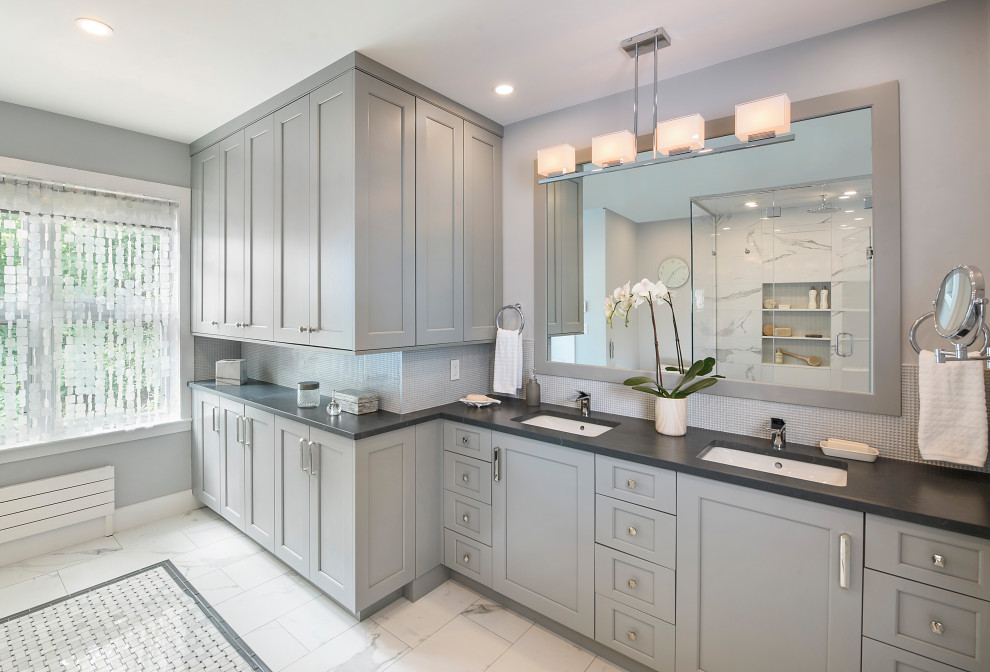 Design ideas for a transitional bathroom in Boston with grey cabinets, an open shower, gray tile, grey walls, marble floors, an undermount sink, engineered quartz benchtops, grey floor, a hinged shower door, black benchtops and a double vanity.