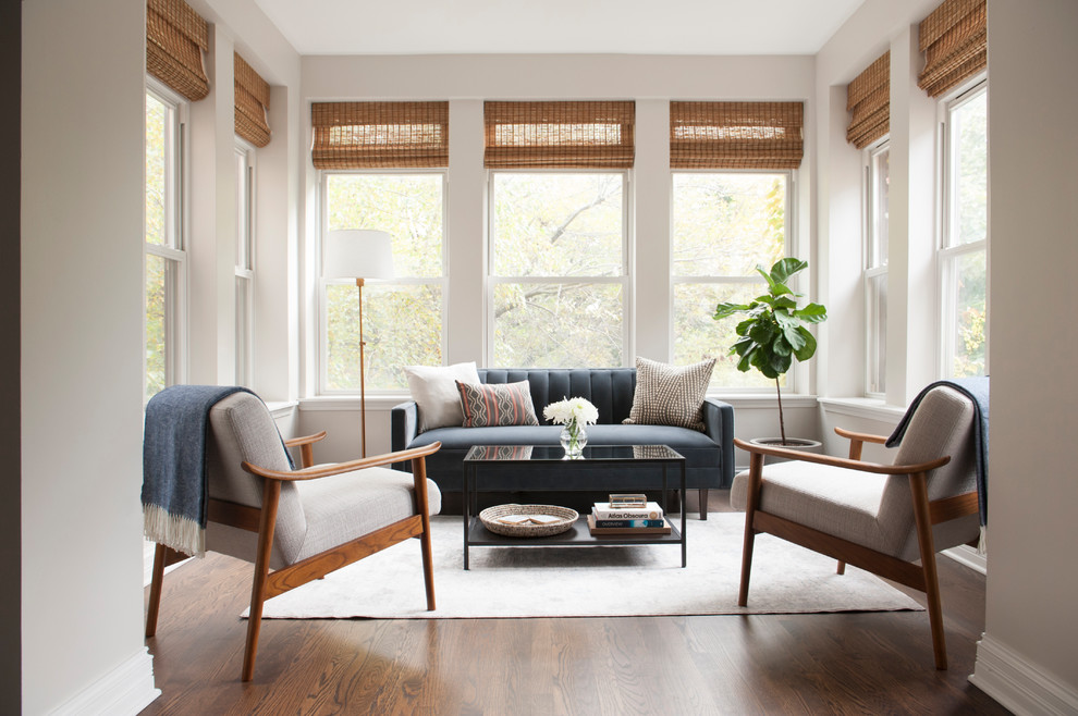 Inspiration for a transitional sunroom in Chicago with medium hardwood floors and brown floor.