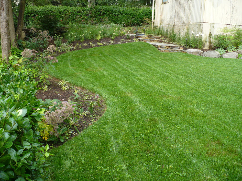 Photo of a mid-sized rustic backyard landscaping in Baltimore.
