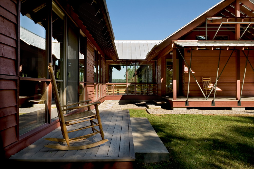 Inspiration for a country exterior in Atlanta with wood siding.