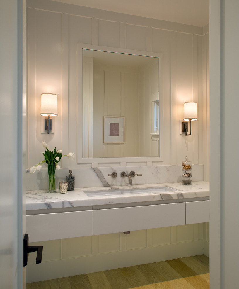 Inspiration for a mid-sized transitional 3/4 light wood floor bathroom remodel in San Diego with an undermount sink, flat-panel cabinets, white cabinets, marble countertops and white walls