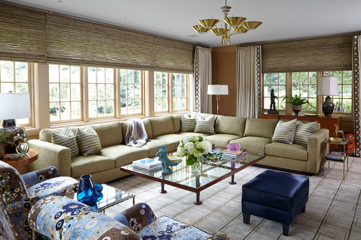 Design ideas for a transitional living room in New York with beige floor.