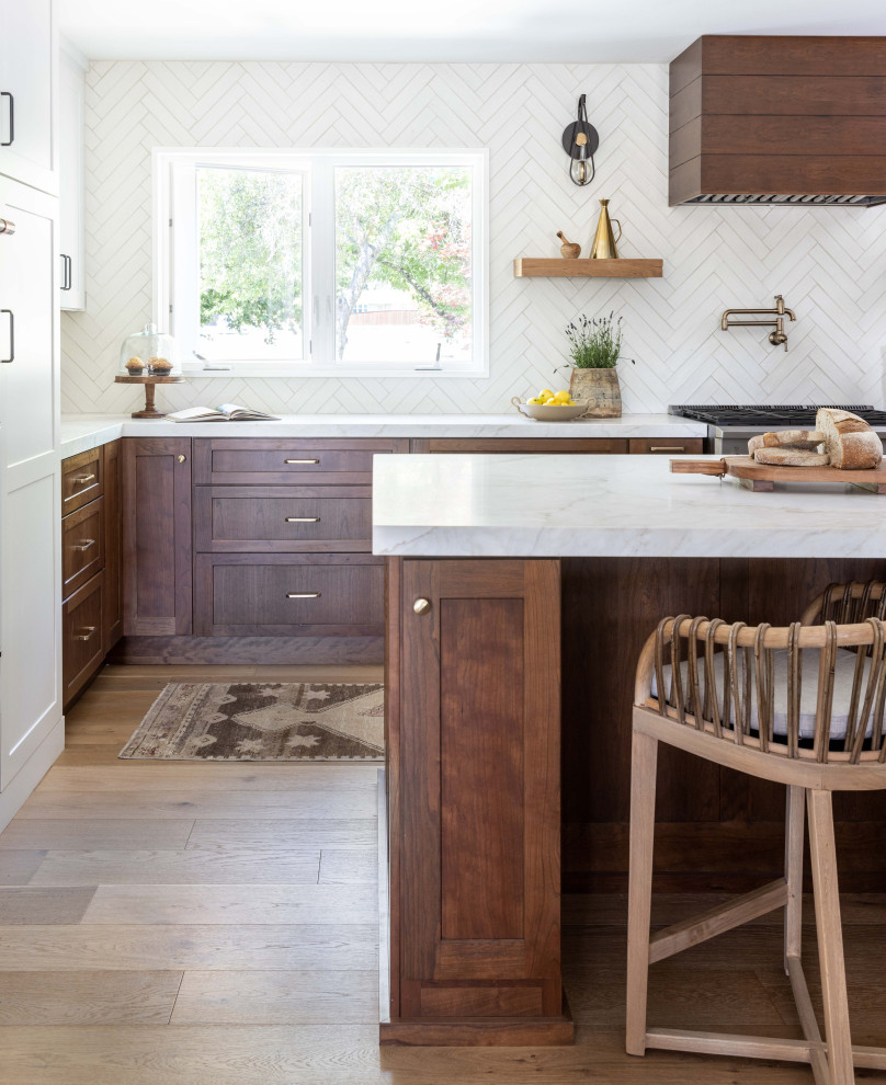 Inspiration for a large transitional galley open plan kitchen in Sacramento with a farmhouse sink, shaker cabinets, medium wood cabinets, marble benchtops, white splashback, terra-cotta splashback, coloured appliances, medium hardwood floors, with island, beige floor and yellow benchtop.