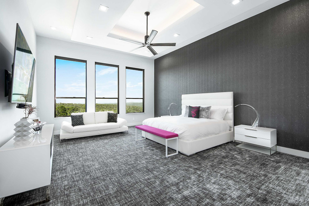 Photo of a modern bedroom in Austin.