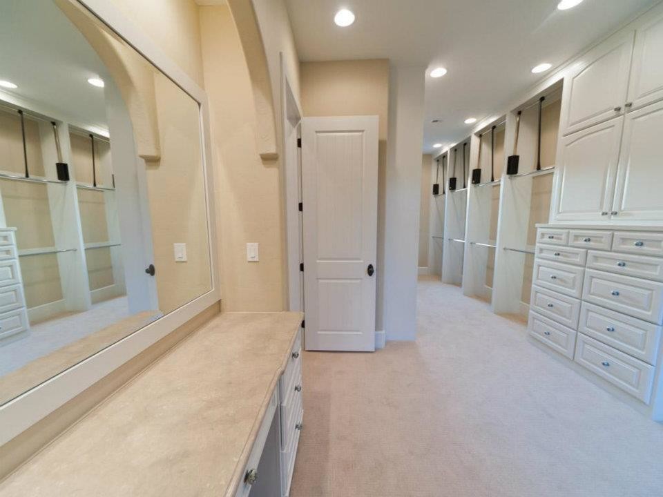Example of a tuscan closet design in Other