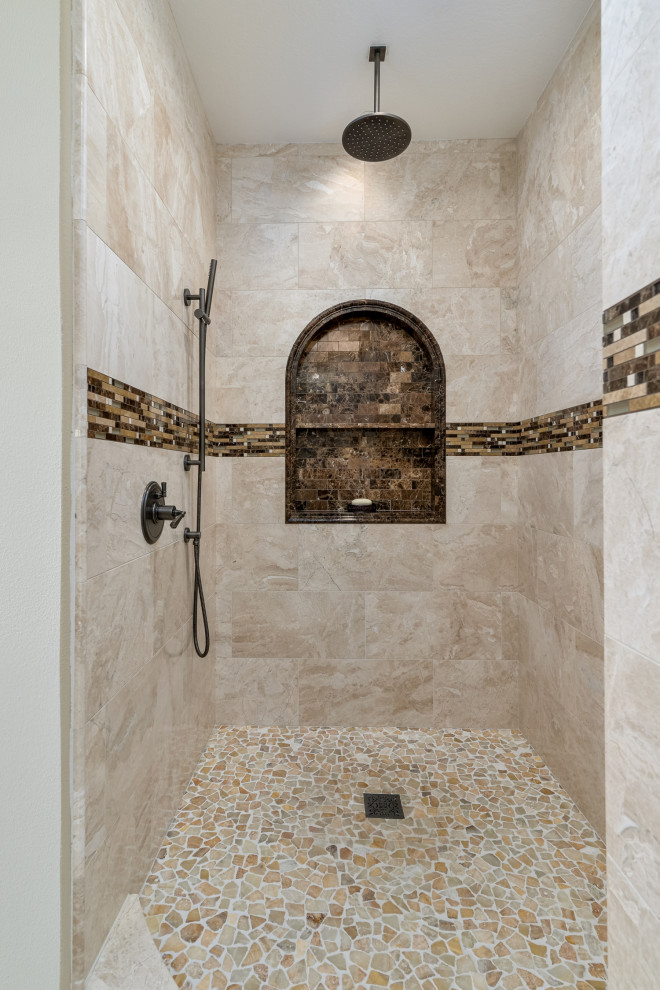 Photo of a large traditional master bathroom in Los Angeles with shaker cabinets, brown cabinets, a freestanding tub, an alcove shower, a one-piece toilet, beige tile, travertine, brown walls, travertine floors, an undermount sink, engineered quartz benchtops, beige floor, an open shower, beige benchtops, an enclosed toilet, a double vanity and a floating vanity.