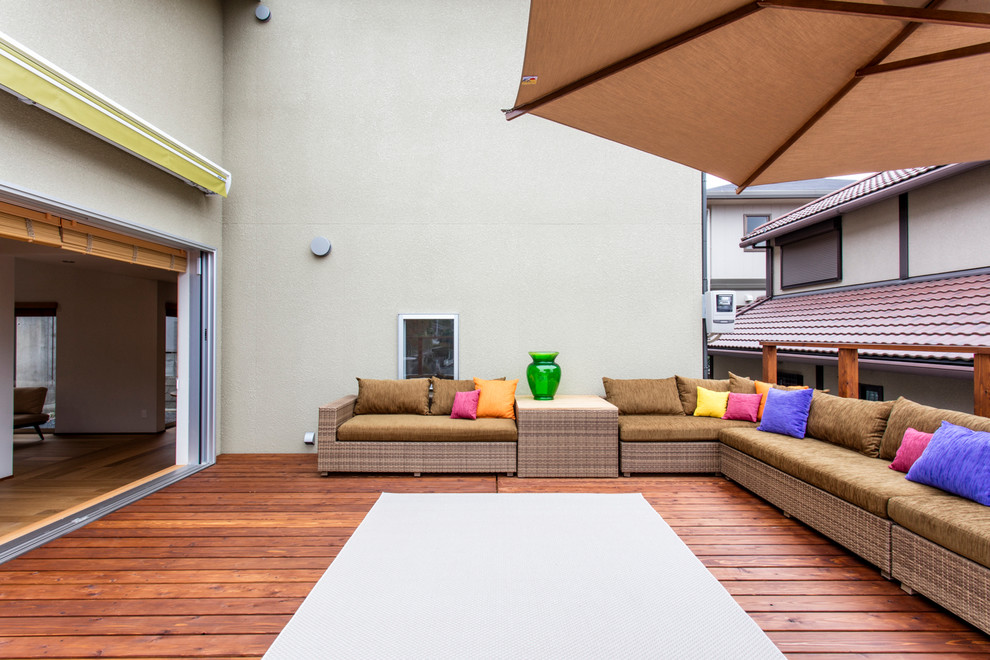 Photo of a contemporary deck in Other with no cover.