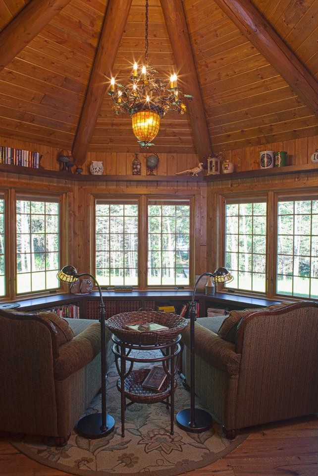 Design ideas for a mid-sized country sunroom in Other with light hardwood floors and a standard ceiling.