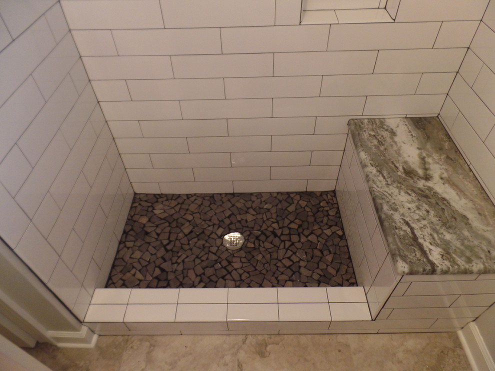 Mid-sized transitional kids' white tile and ceramic tile porcelain tile and gray floor home design photo with shaker cabinets, green cabinets, a two-piece toilet, gray walls, an undermount sink, marble countertops and a hinged shower door