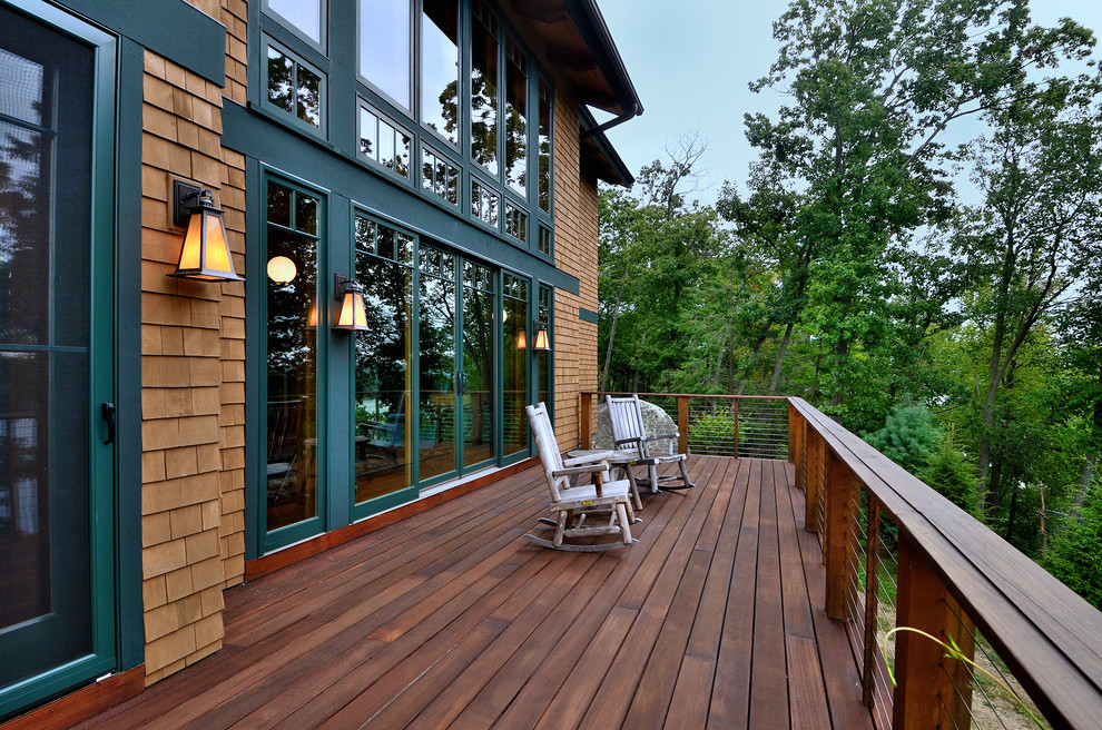Large country backyard deck in New York with no cover.