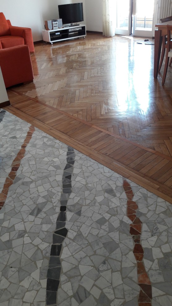 Soggiorno dopo il restauro marmi e parquet