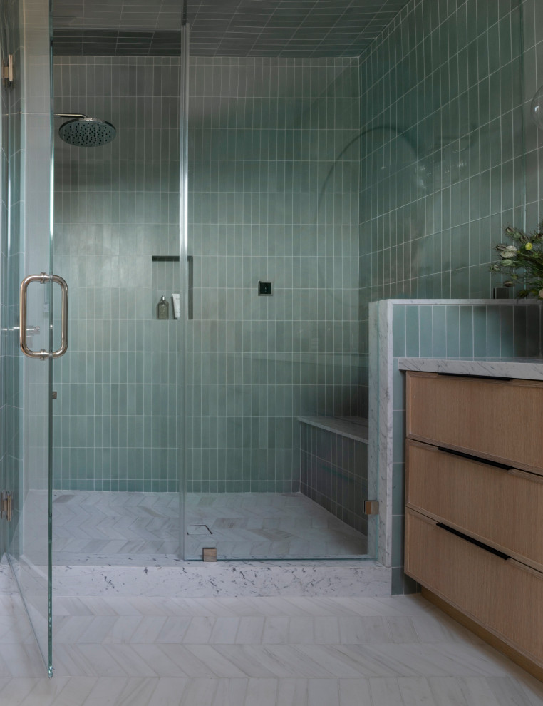Design ideas for a mid-sized contemporary bathroom in San Francisco with shaker cabinets, light wood cabinets, green tile, ceramic tile, white walls, marble floors, an undermount sink, marble benchtops, white floor, white benchtops, a shower seat, a single vanity and a built-in vanity.