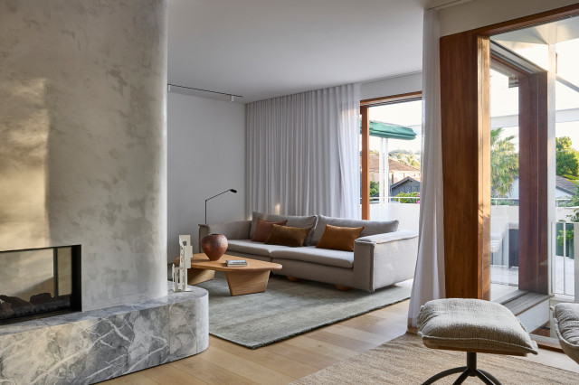 Family Lounge with Fireplace and Balcony Access contemporary-living-room