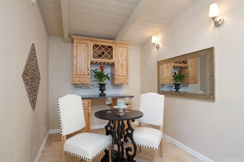 Inspiration for a transitional dining room remodel in Orange County
