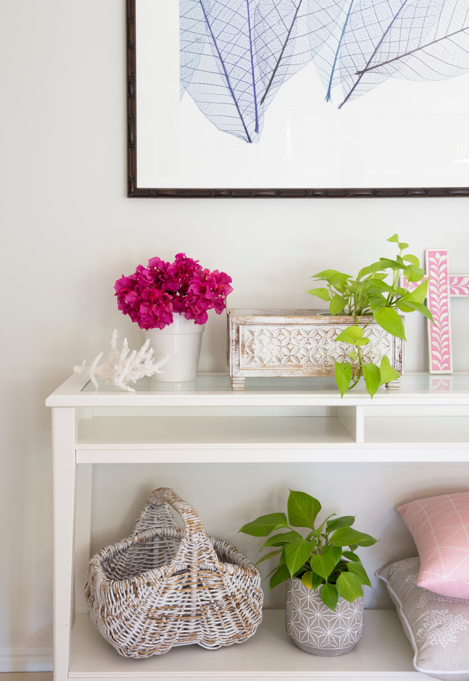 This is an example of a small traditional hallway in Gold Coast - Tweed with grey walls and ceramic floors.