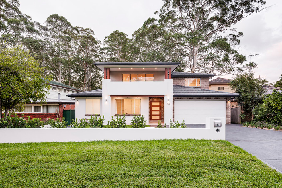 Contemporary two-storey white house exterior in Sydney.